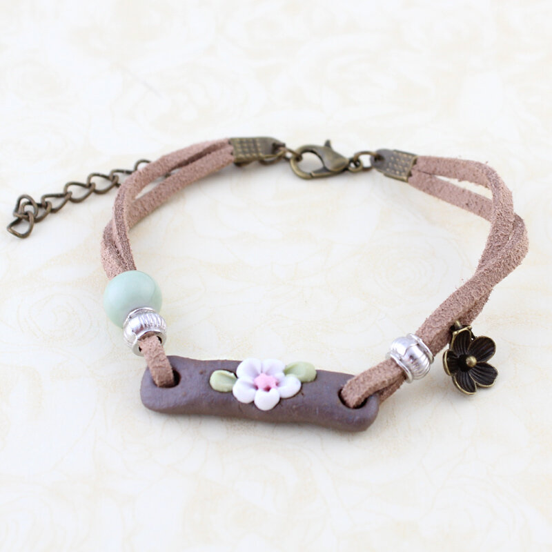 Bransoletka Boho z ceramicznym kwiatkiem Bransoletka Boho z ceramicznym kwiatkiem
