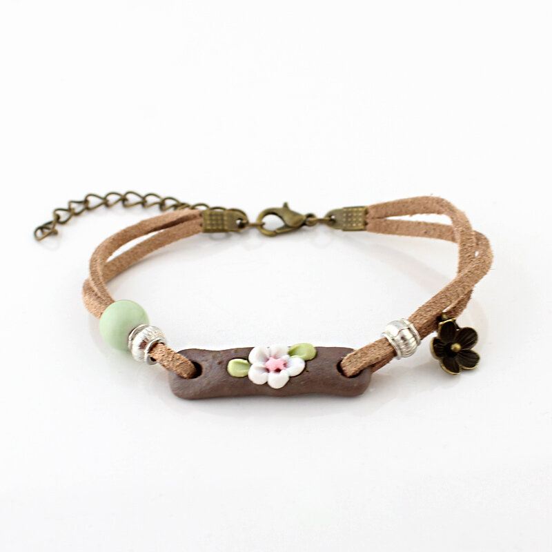 Bransoletka Boho z ceramicznym kwiatkiem Bransoletka Boho z ceramicznym kwiatkiem