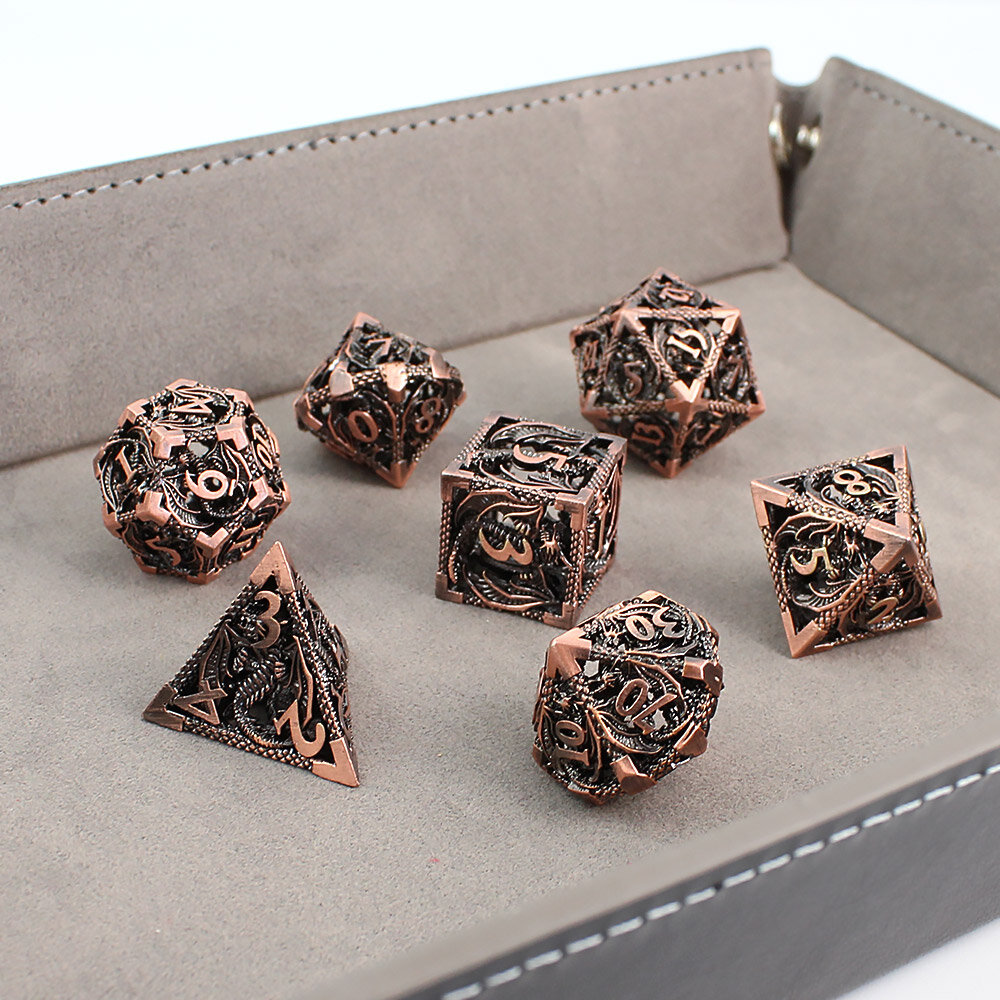 Metalowe ażurowe kości RPG z motywem smoków w kolorze oksydowanej miedzi | Kości Metalowe Dragon's Breath Hollow Lume Design