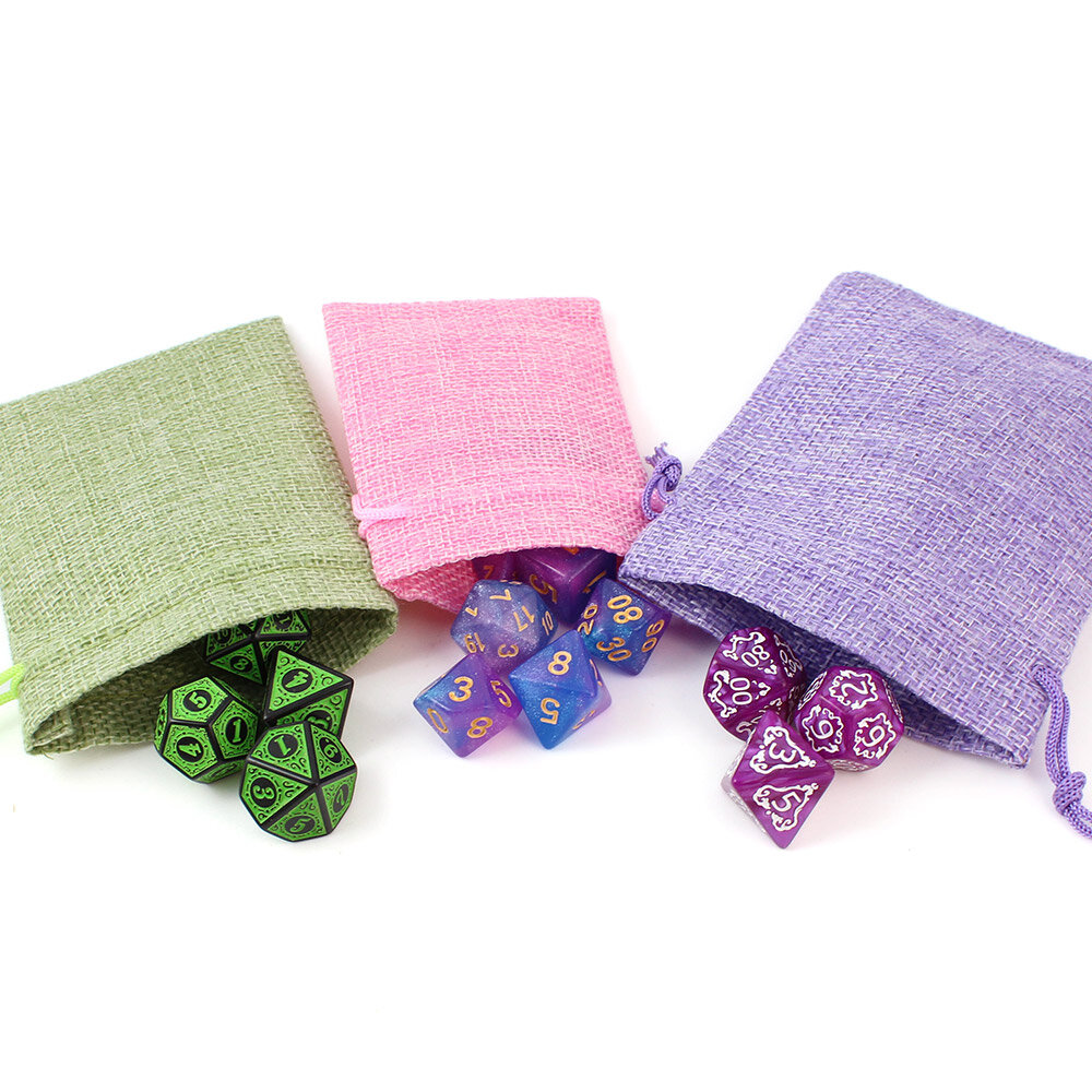 Zestaw brokatowych kości RPG Astro Dust w kolorach niebieskim i fioletowym ze złotymi cyframi.
