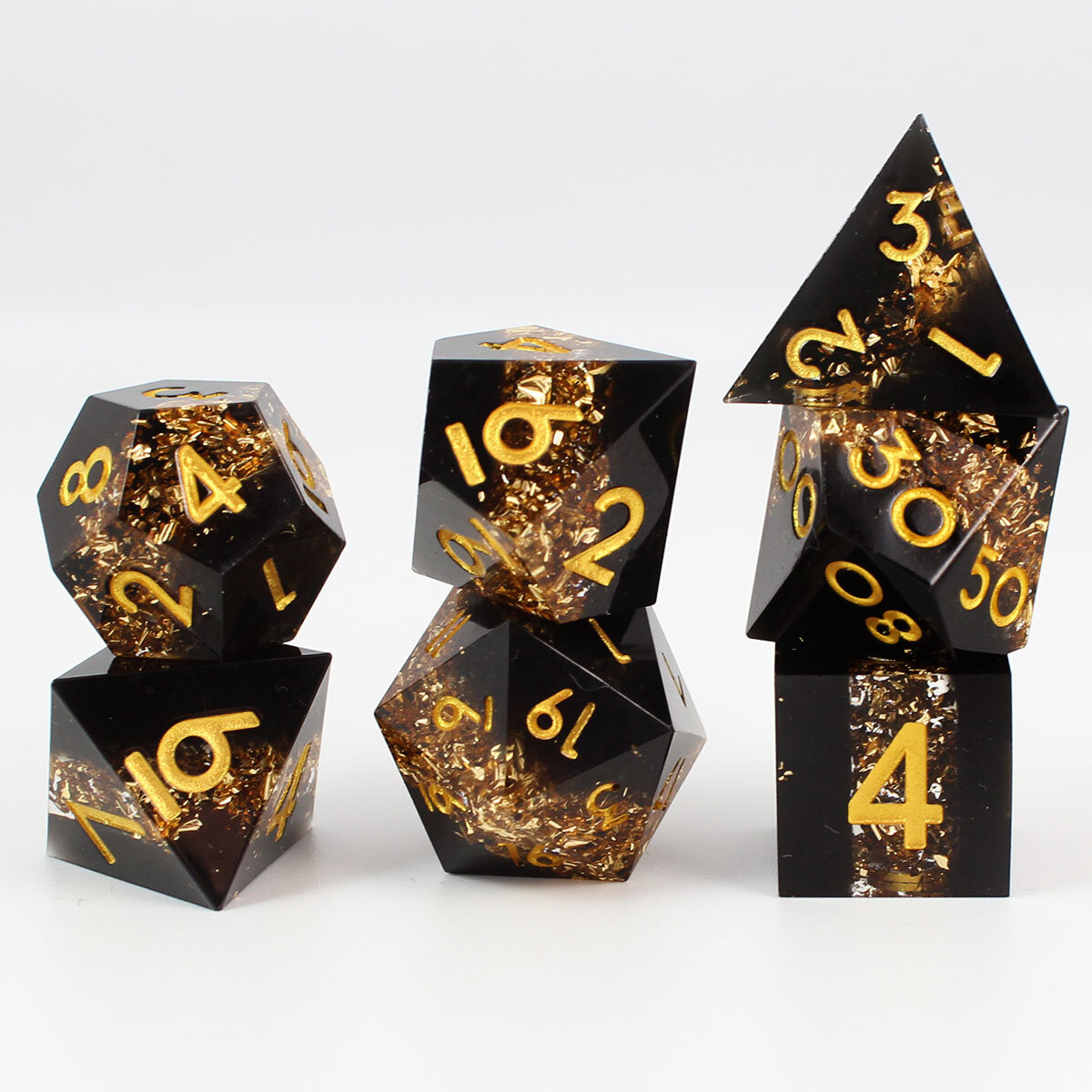 Zestaw kości RPG Ancient Gold Vein Ore czarne ze złotymi drobinkami ostre krawędzie