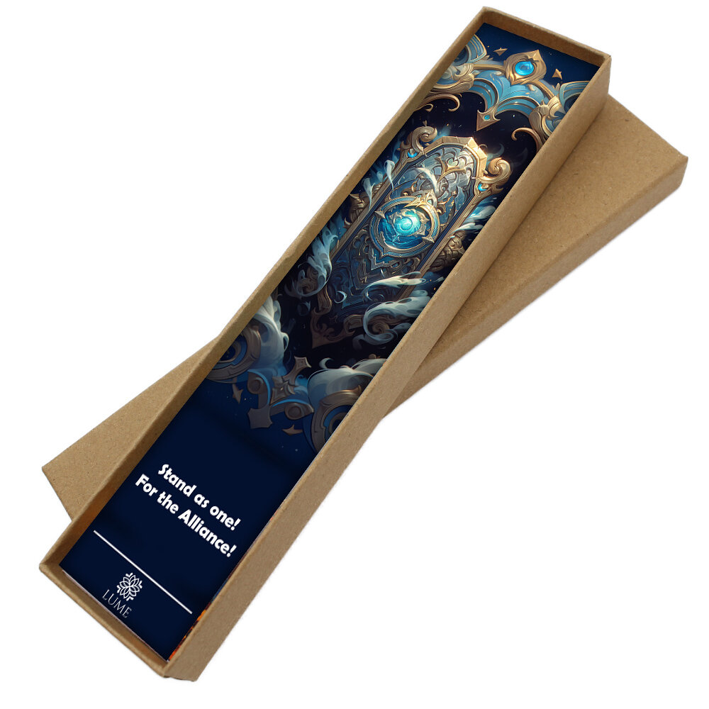 Zakładka do książki z antycznego brązu z motywem smoka i zawieszką z logiem Przymierza (Alliance) z gry World of Warcraft pod kaboszonem.