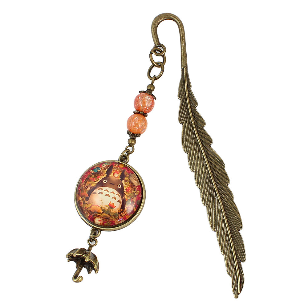 Zakładka do książki z antycznego brązu z motywem w kształcie sowy, małym listkiem i uroczym Duchem Lasu Totoro z parasolką pod szkłem.