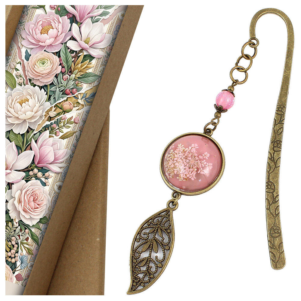 Zakładka do książki z antycznego brązu z różowym koralikiem, listkiem i uwięzionymi w różowej żywicy prawdziwymi, drobnymi suszonymi kwiatami.