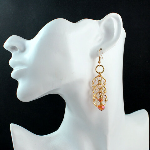 Długie kolczyki płatki przezroczyste złote brzegi kryształki Lume Design