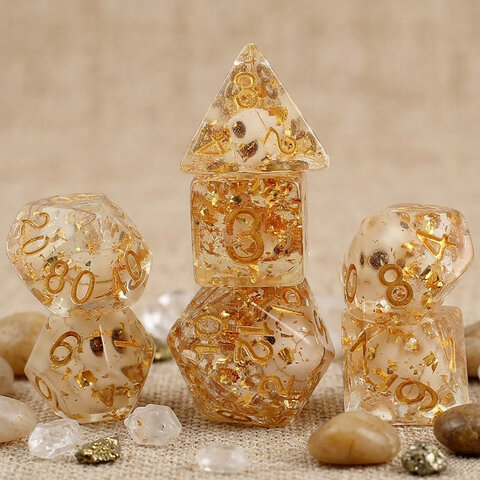 Zestaw 7 biało-złotych kości RPG z żywicy o zaokrąglonych krawędziach | Kości Żywiczne Outlet Veiled Skulls Lume Design