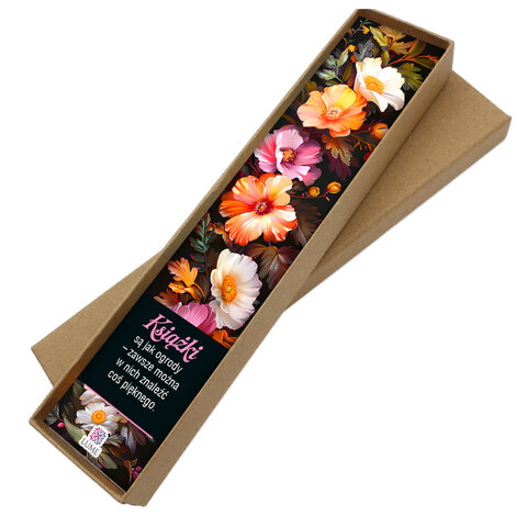 Zakładka do książki z antycznego brązu z różowymi kryształkami i owalnym szklanym kaboszonem z grafiką ptaszków i kwiatów na łące.