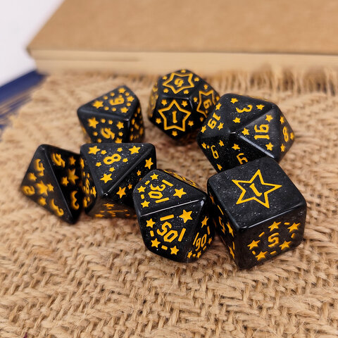 Zestaw kości RPG Midnight Stars czarne w żółte gwiazdki